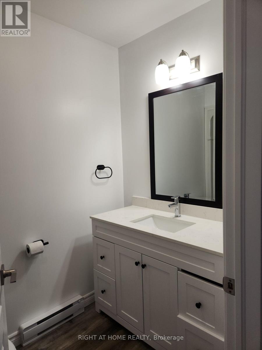 203 - 9 Queen Street W, Springwater, Ontario  L0L 1P0 - Photo 6 - S12449641