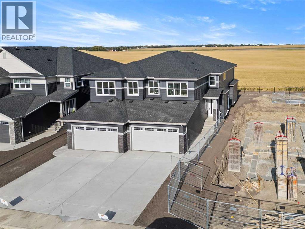 466 Kinniburgh Loop, Chestermere, Alberta  T1X 3C2 - Photo 3 - A2261664