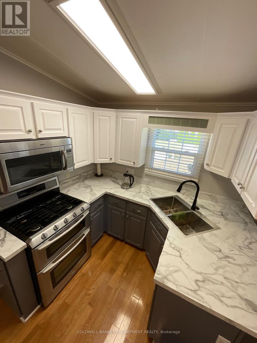 5 Spruce - 4449 Milburough Line, Burlington, Ontario  L7P 0P5 - Photo 5 - W12449663