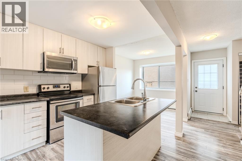 293 Fairway Road N Unit# 26, Kitchener, Ontario  N2A 2P1 - Photo 1 - 40758466