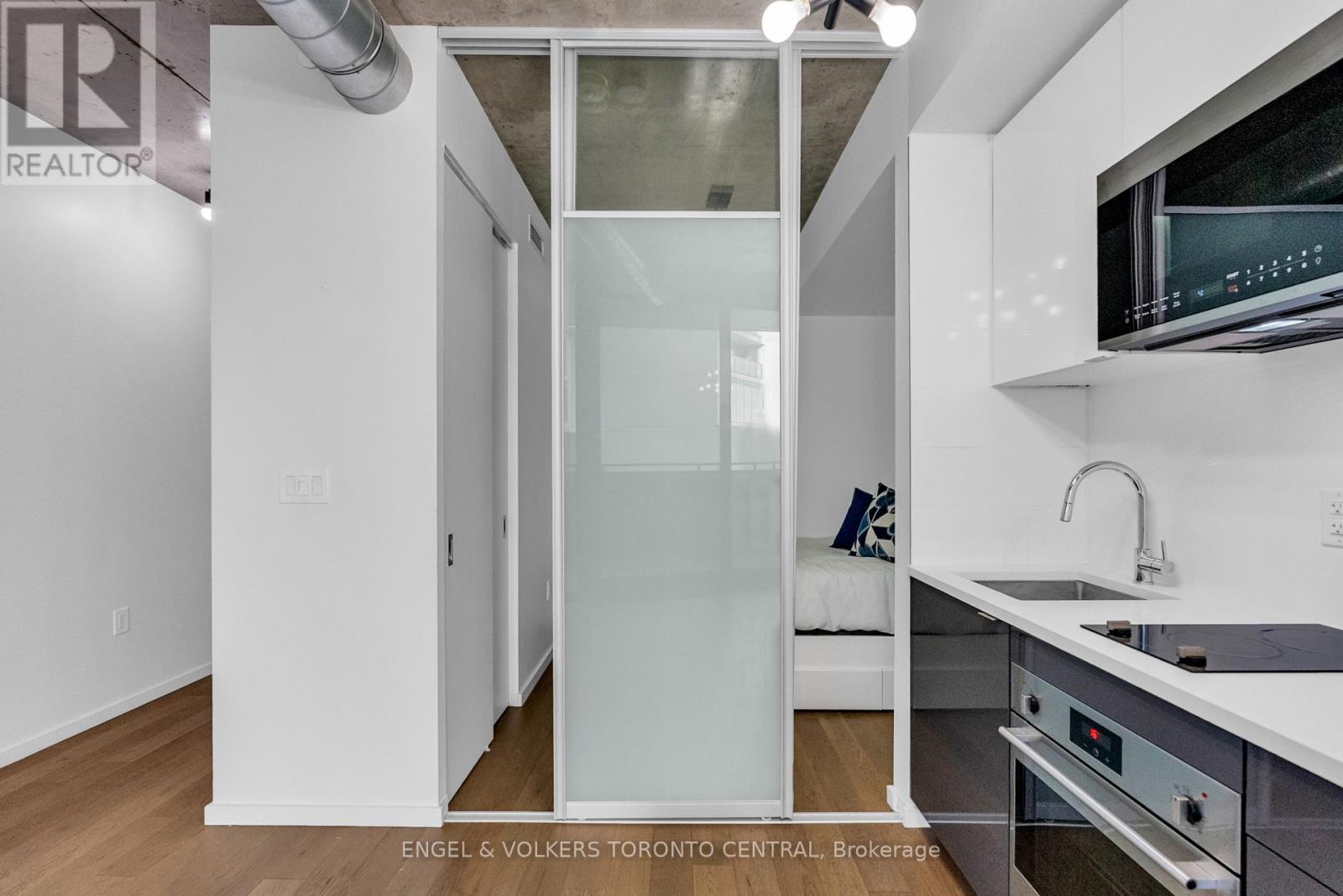 310 - 21 Lawren Harris Square, Toronto, Ontario  M5A 0T4 - Photo 4 - C12450006