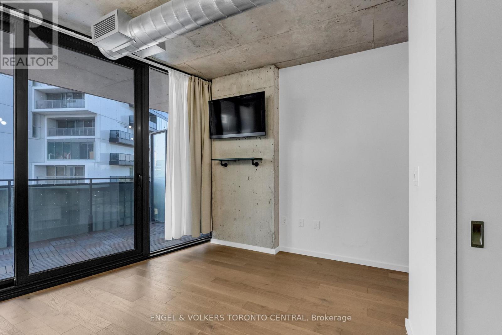 310 - 21 Lawren Harris Square, Toronto, Ontario  M5A 0T4 - Photo 5 - C12450006