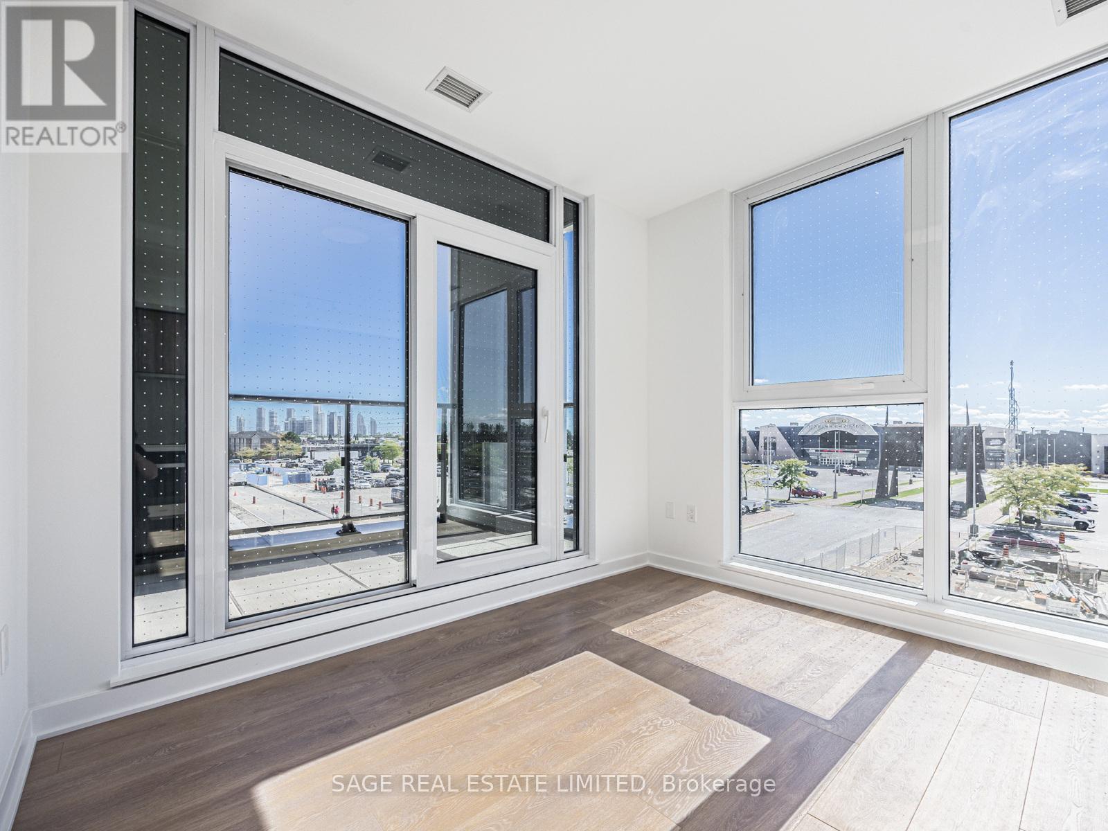 202 - 1037 The Queensway Avenue, Toronto, Ontario  M8Z 6C7 - Photo 3 - W12449866