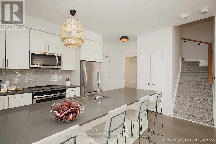 Th-17 - 4055 Parkside Village Drive, Mississauga, Ontario  L5B 0K8 - Photo 8 - W12449967