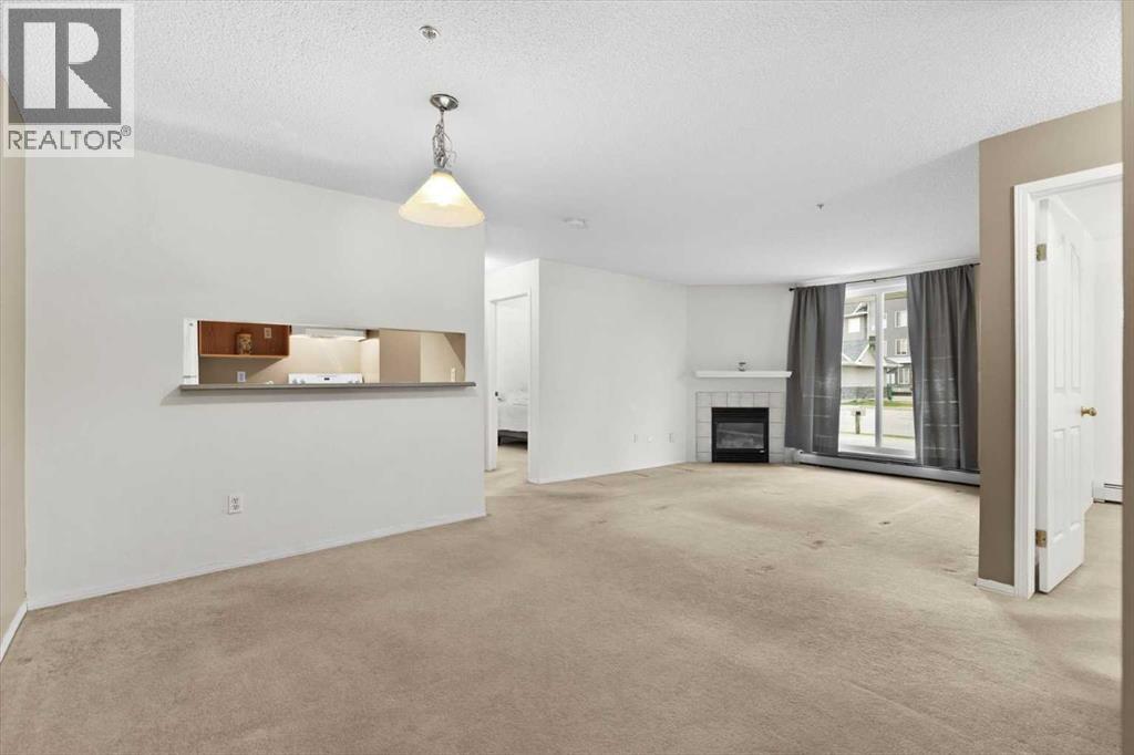 2113, 2113 Tuscarora Manor Nw, Calgary, Alberta  T3L 2J9 - Photo 4 - A2262593