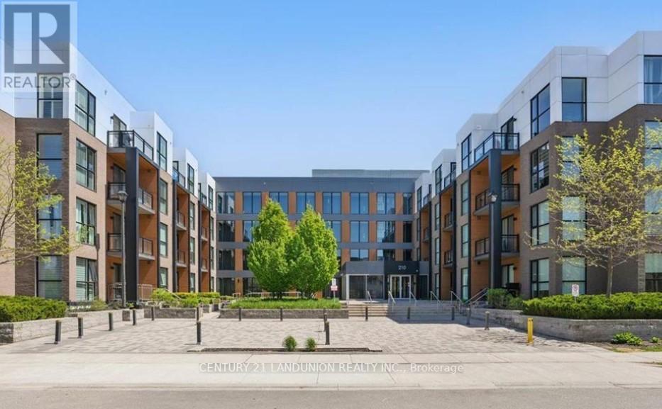 115 - 210 Sabina Drive, Oakville, Ontario  L6H 0W6 - Photo 1 - W12450137