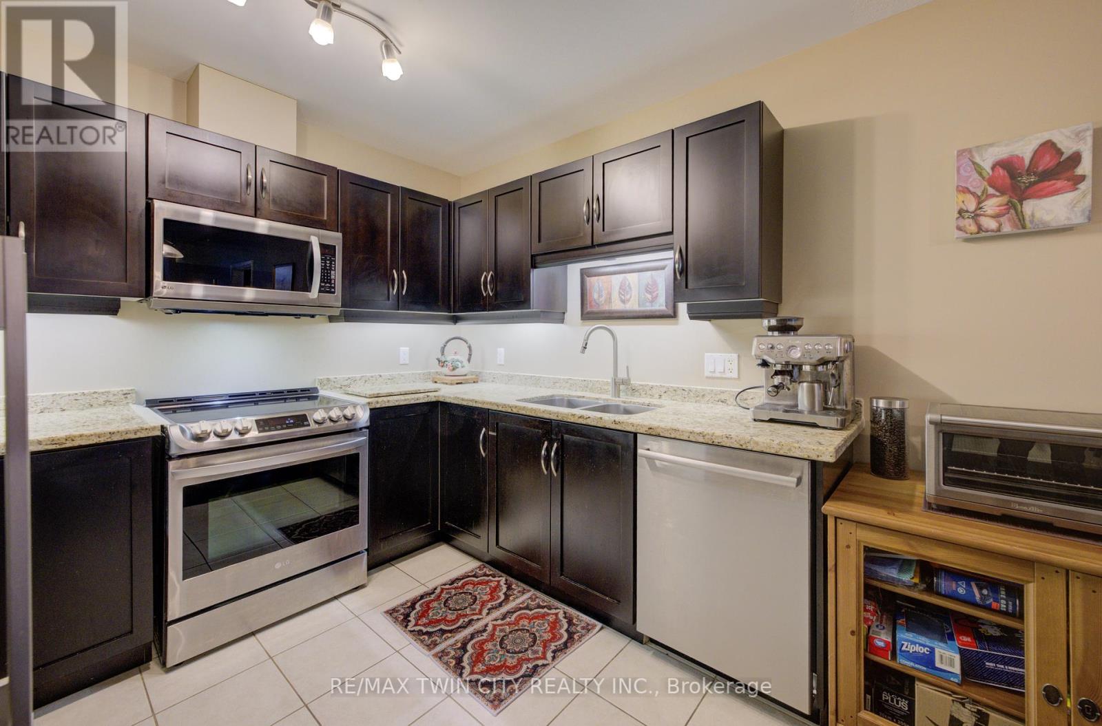 105 - 165 Duke Street E, Kitchener, Ontario  N2H 6T8 - Photo 3 - X12450132