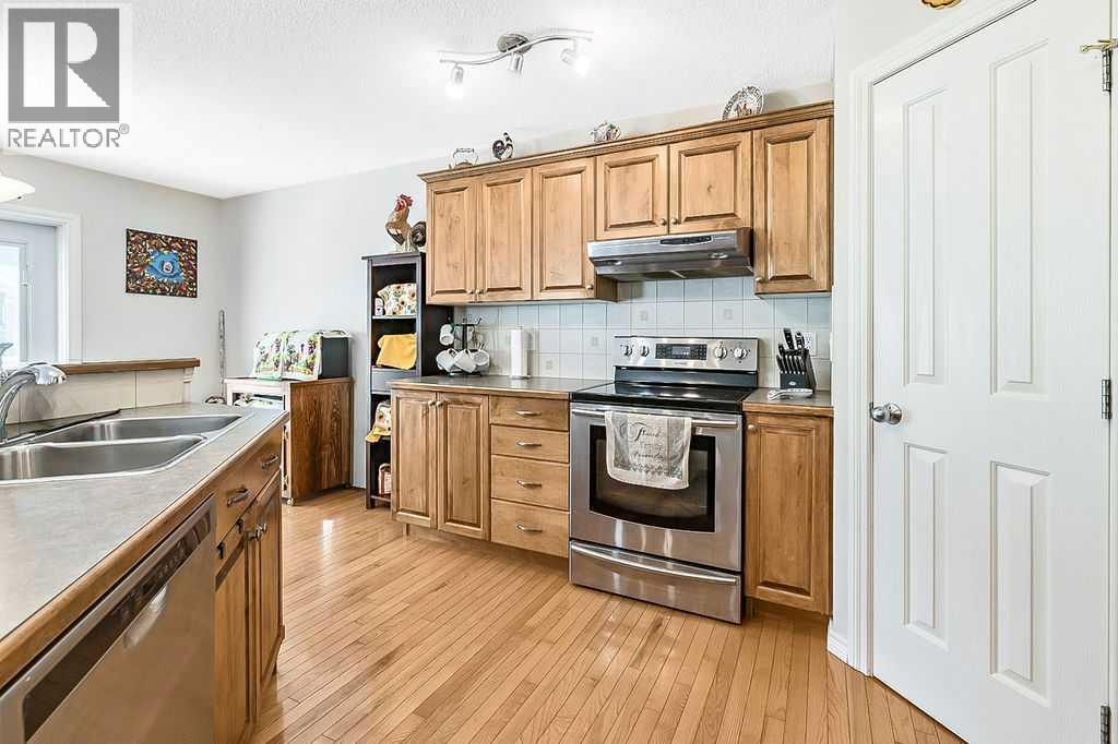54 Cimarron Trail, Okotoks, Alberta  T1S 2E6 - Photo 7 - A2261880
