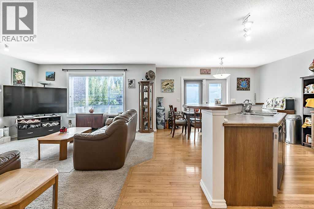 54 Cimarron Trail, Okotoks, Alberta  T1S 2E6 - Photo 4 - A2261880