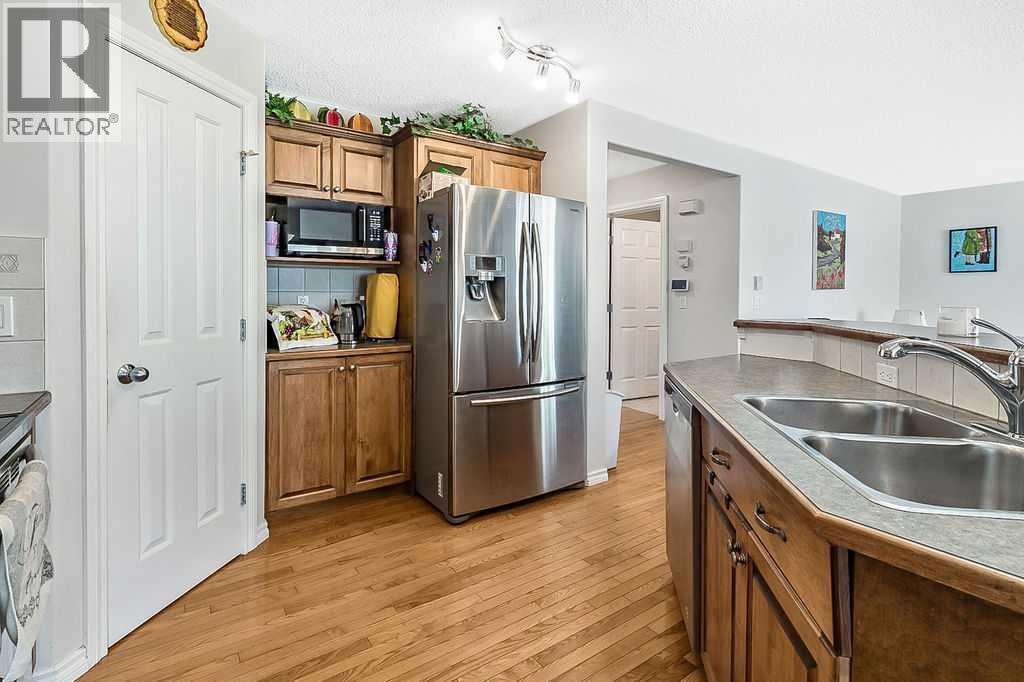 54 Cimarron Trail, Okotoks, Alberta  T1S 2E6 - Photo 9 - A2261880