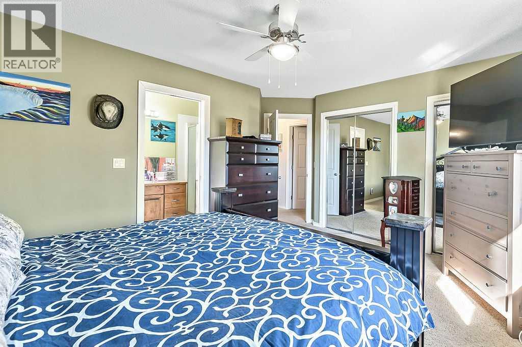 54 Cimarron Trail, Okotoks, Alberta  T1S 2E6 - Photo 18 - A2261880