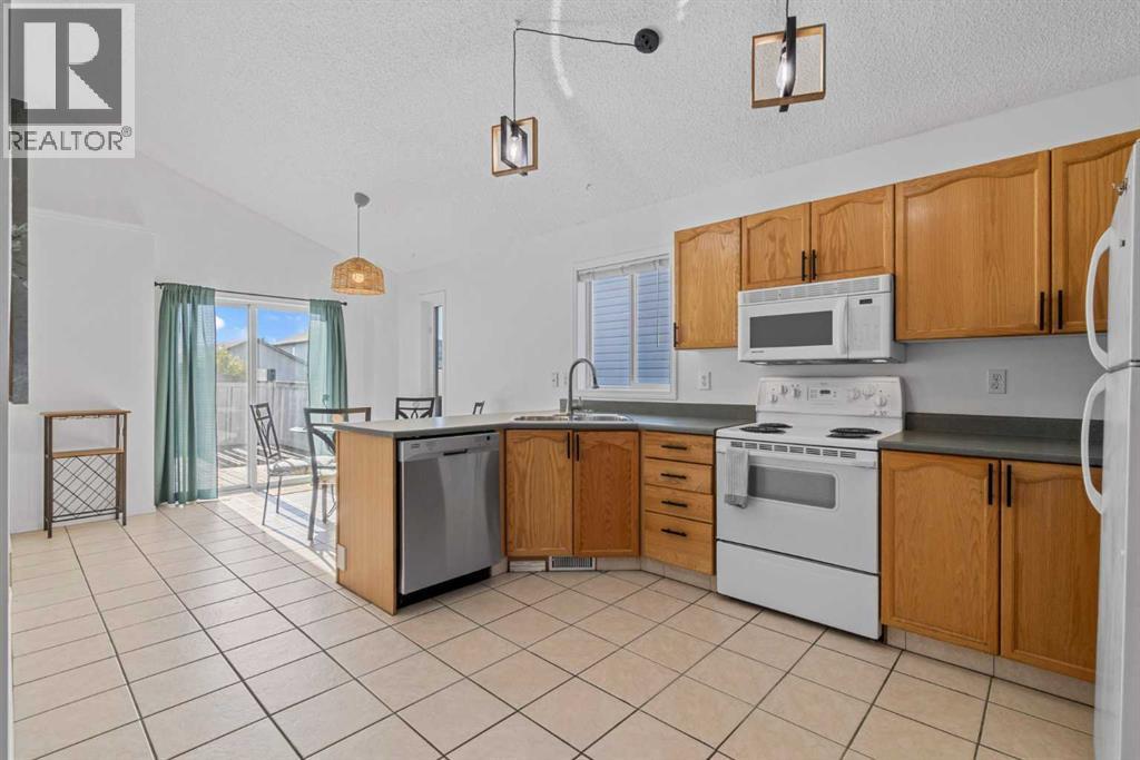 69 San Diego Manor Ne, Calgary, Alberta  T1Y 7B6 - Photo 6 - A2259940