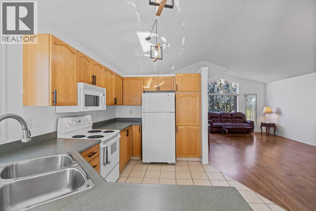 69 San Diego Manor Ne, Calgary, Alberta  T1Y 7B6 - Photo 8 - A2259940