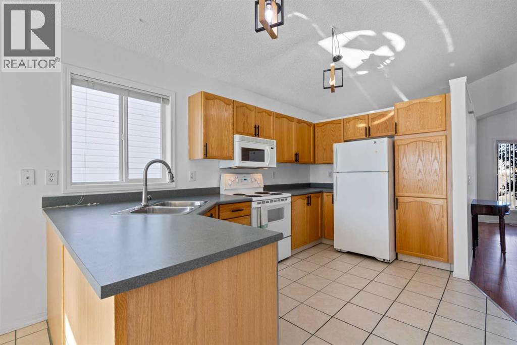69 San Diego Manor Ne, Calgary, Alberta  T1Y 7B6 - Photo 7 - A2259940