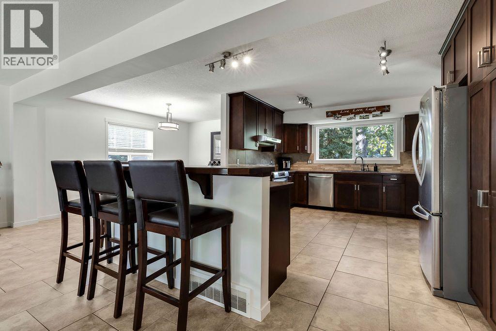 12 Suntree Lane, Okotoks, Alberta  T1S 1B9 - Photo 7 - A2253886