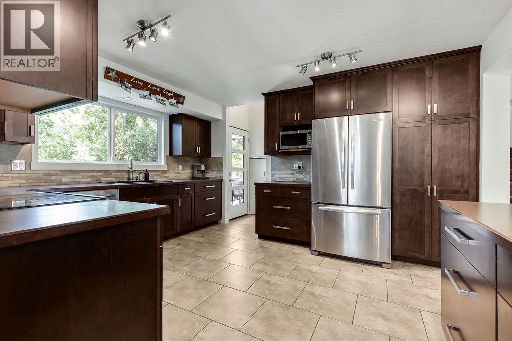 12 Suntree Lane, Okotoks, Alberta  T1S 1B9 - Photo 6 - A2253886