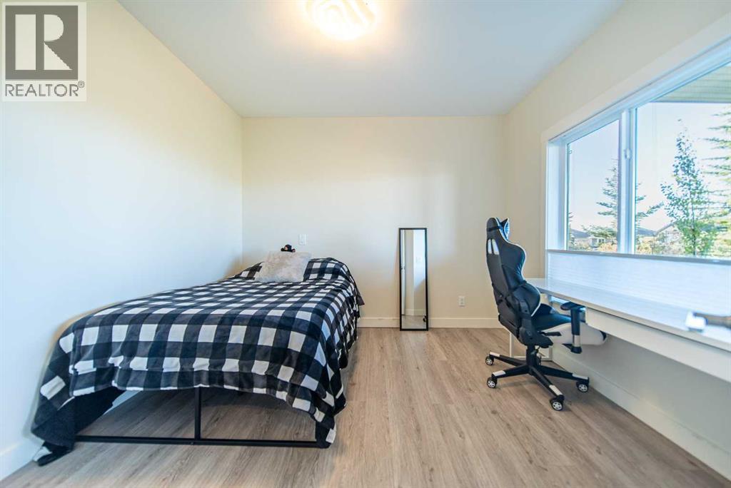 27 Sunset Park, Cochrane, Alberta  T4C 0N4 - Photo 42 - A2262469
