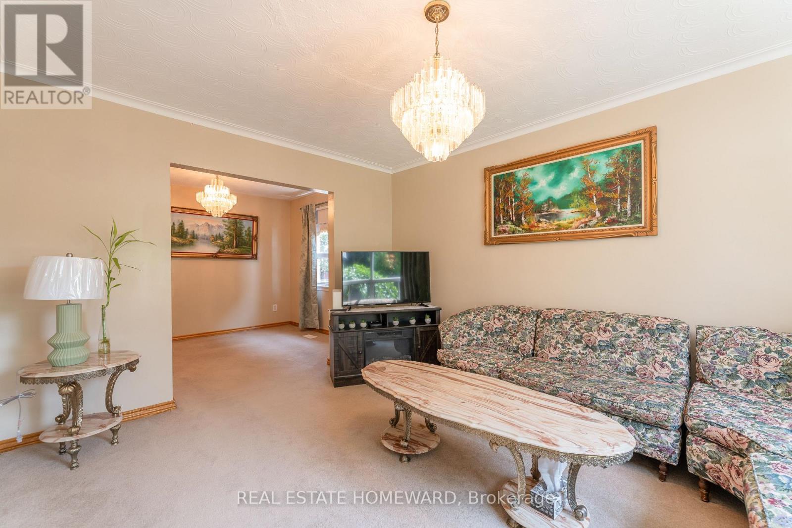 331 Rhodes Avenue, Toronto, Ontario  M4L 3A4 - Photo 3 - E12431413
