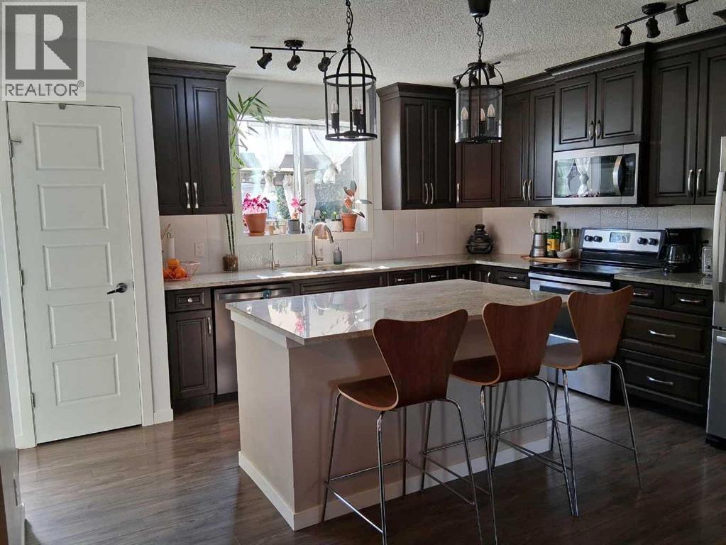 49 Fireside Bend, Cochrane, Alberta  T4C 0V6 - Photo 5 - A2262492