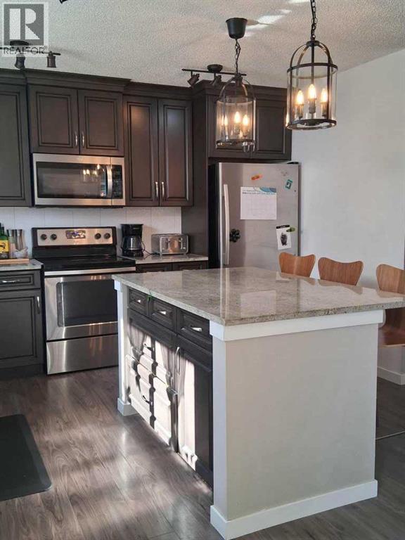 49 Fireside Bend, Cochrane, Alberta  T4C 0V6 - Photo 6 - A2262492