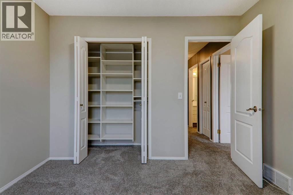 435 Douglas Ridge Mews Se, Calgary, Alberta  T2Z 2M4 - Photo 24 - A2262784