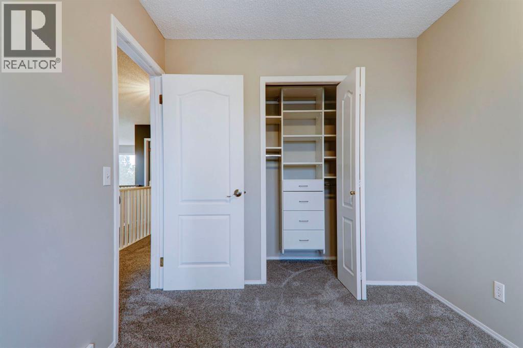 435 Douglas Ridge Mews Se, Calgary, Alberta  T2Z 2M4 - Photo 25 - A2262784