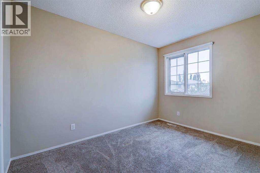 435 Douglas Ridge Mews Se, Calgary, Alberta  T2Z 2M4 - Photo 29 - A2262784