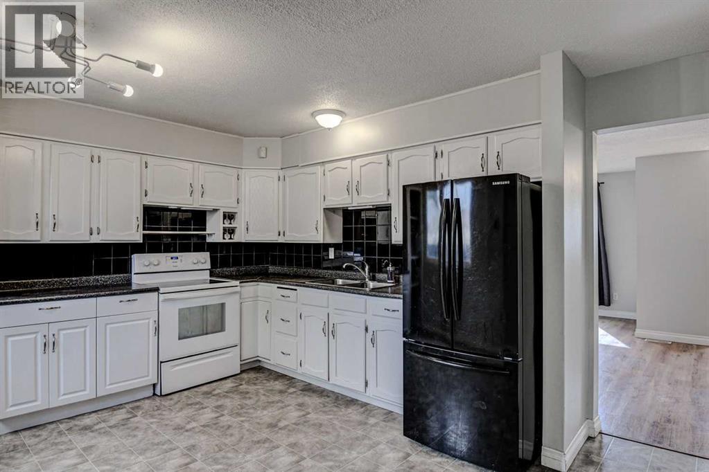 3014 Dover Crescent Se, Calgary, Alberta  T2B 1Y2 - Photo 4 - A2255740