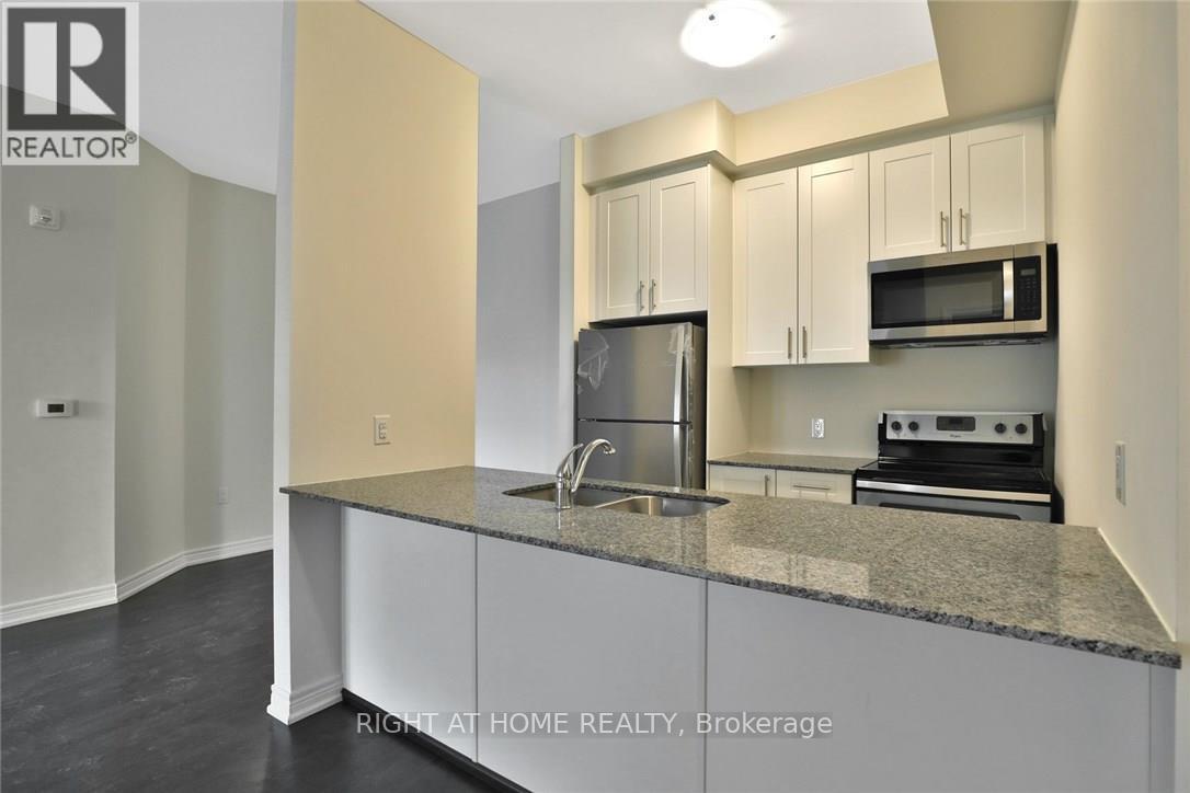 104 - 2388 Khalsa Gate, Oakville, Ontario  L6M 1P5 - Photo 4 - W12450719