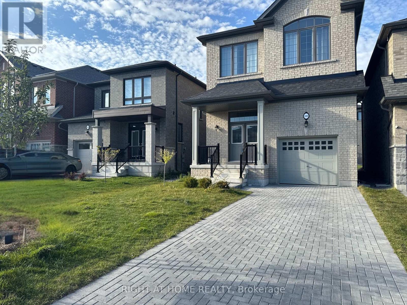 1202 Rexton Drive, Oshawa, Ontario  L1H 8L7 - Photo 2 - E12450808