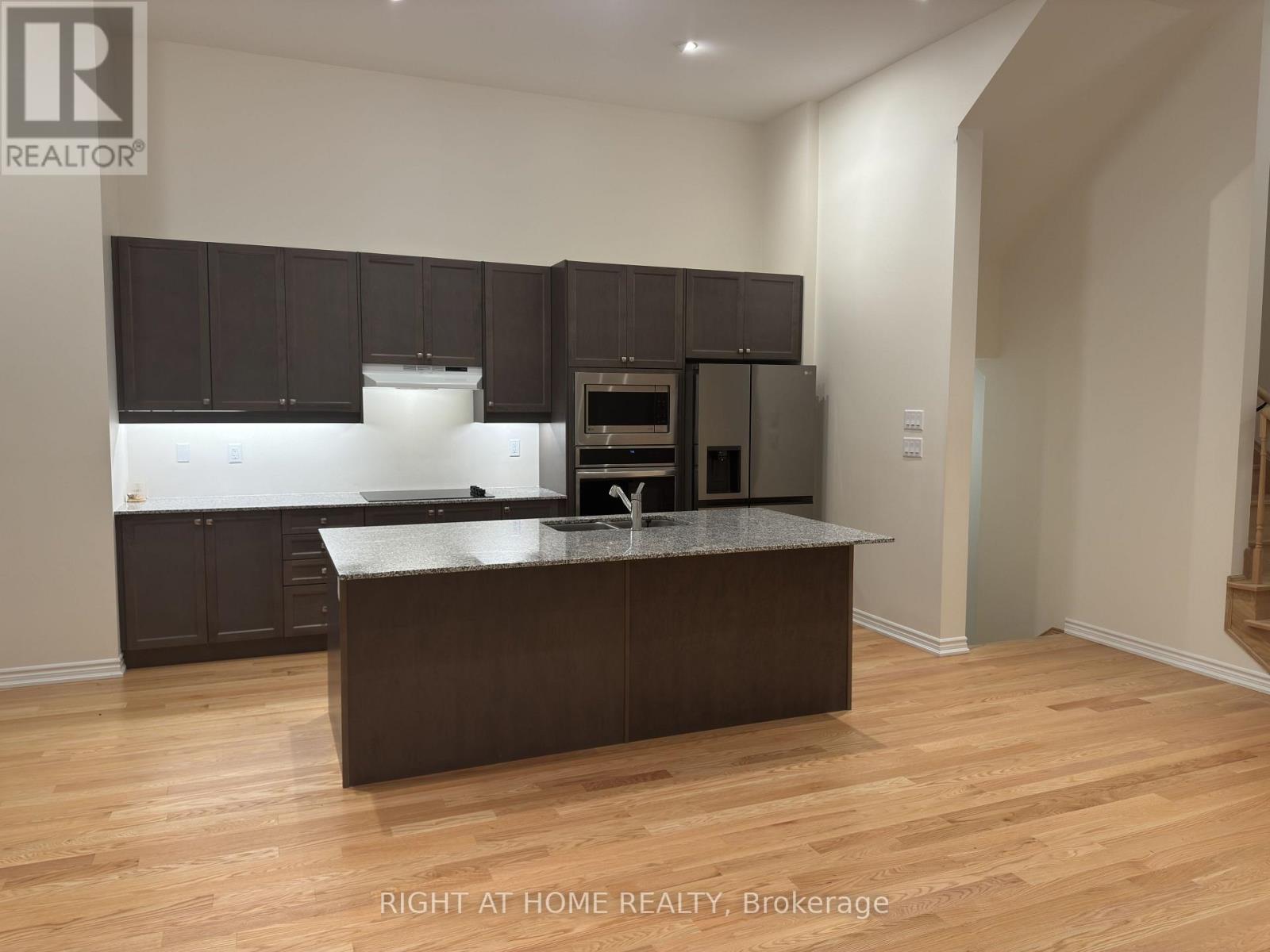 1202 Rexton Drive, Oshawa, Ontario  L1H 8L7 - Photo 6 - E12450808