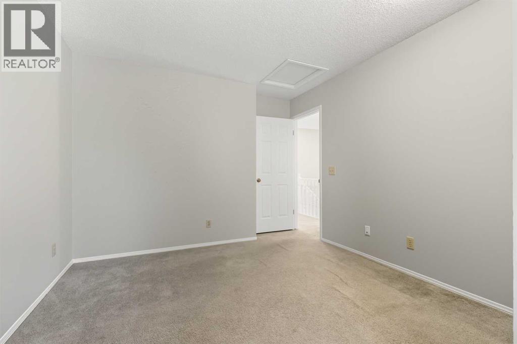12 Coachway Gardens Sw, Calgary, Alberta  T3H 2V9 - Photo 20 - A2257840
