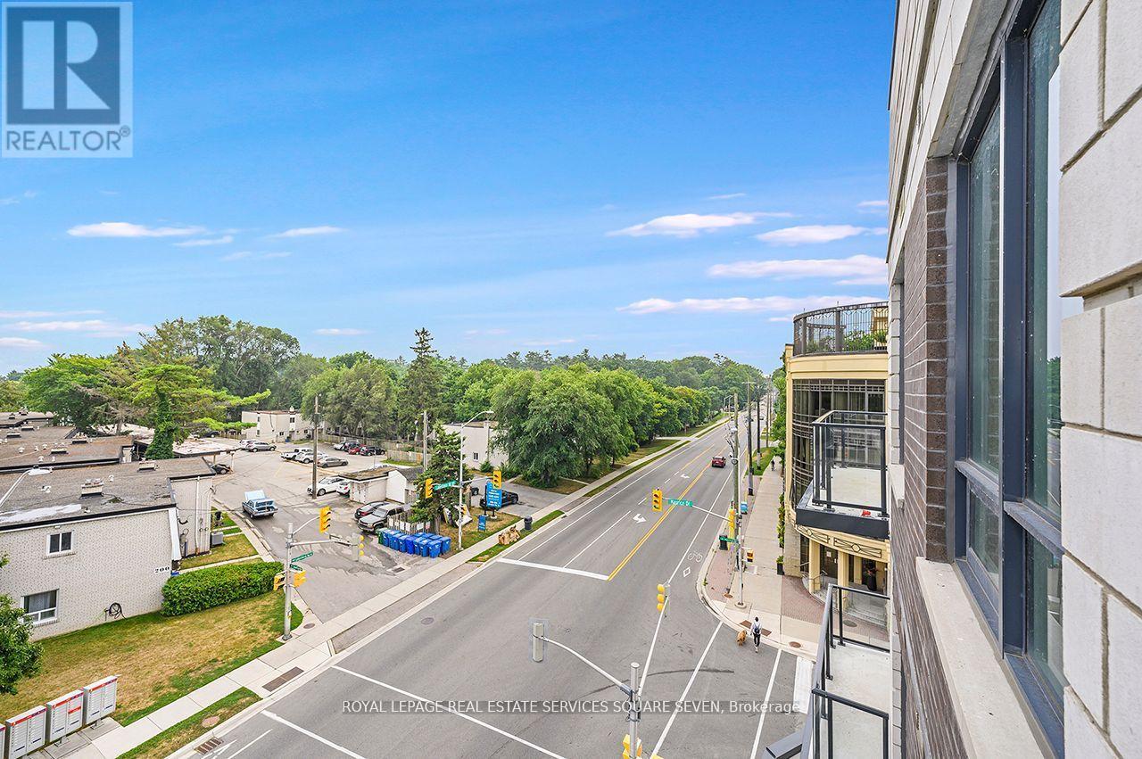 412 - 123 Maurice Drive, Oakville (Co Central), Ontario  L6K 2W6 - Photo 13 - W12450852