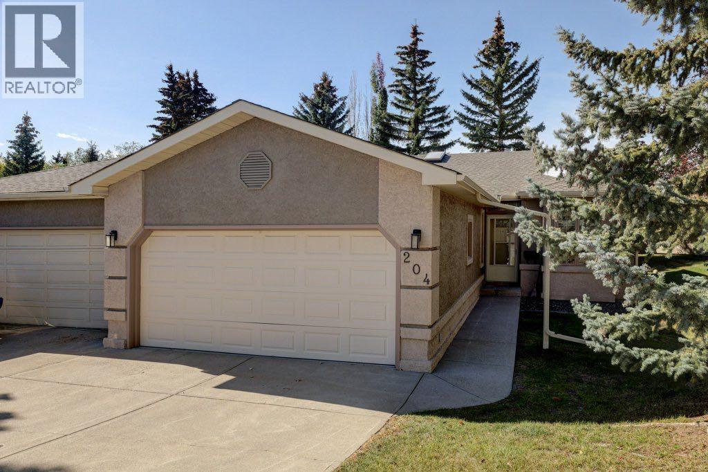 204 Silver Creek Mews Nw, Calgary, Alberta  T3B 5L1 - Photo 3 - A2260595