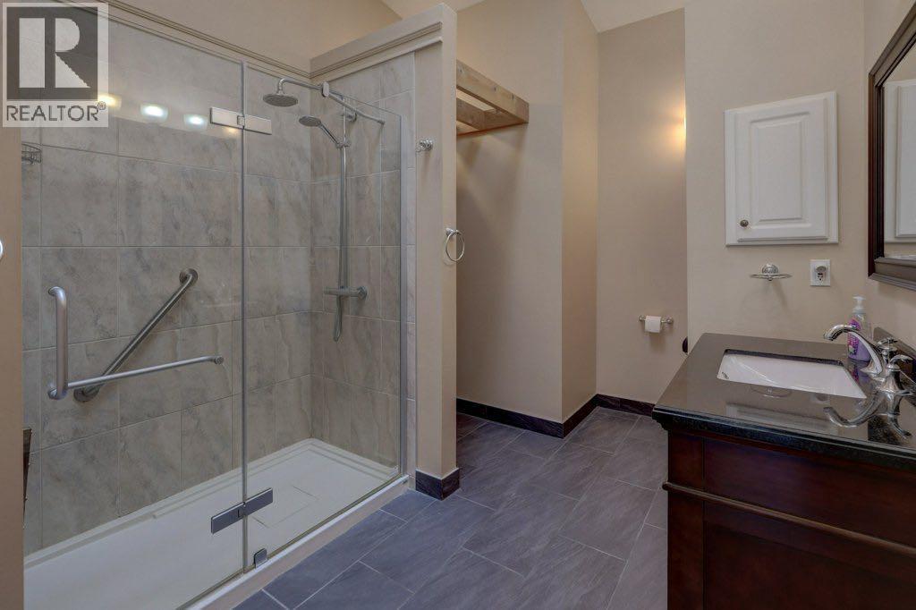 204 Silver Creek Mews Nw, Calgary, Alberta  T3B 5L1 - Photo 15 - A2260595