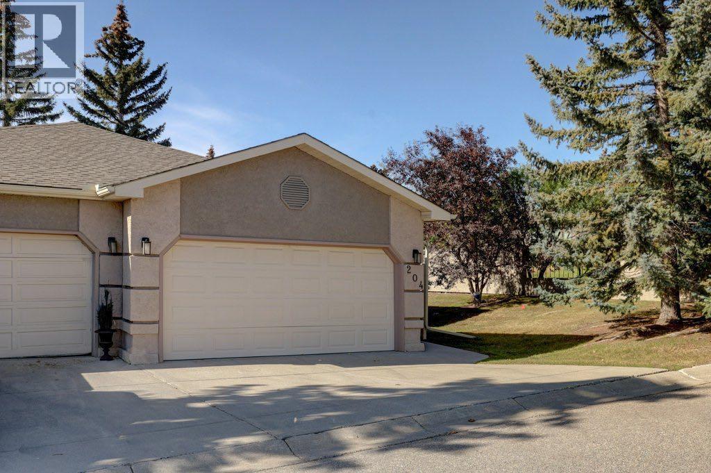 204 Silver Creek Mews Nw, Calgary, Alberta  T3B 5L1 - Photo 1 - A2260595