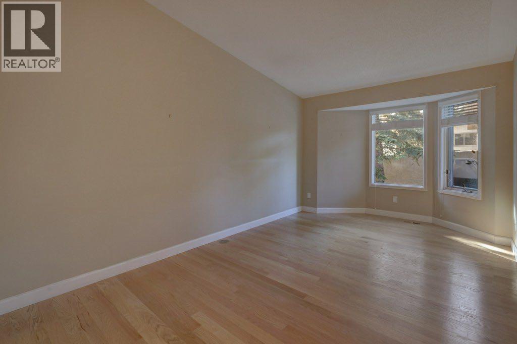 204 Silver Creek Mews Nw, Calgary, Alberta  T3B 5L1 - Photo 13 - A2260595