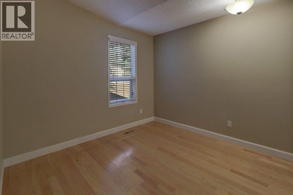 204 Silver Creek Mews Nw, Calgary, Alberta  T3B 5L1 - Photo 19 - A2260595