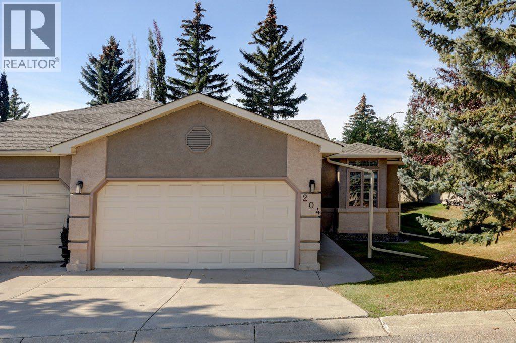 204 Silver Creek Mews Nw, Calgary, Alberta  T3B 5L1 - Photo 2 - A2260595