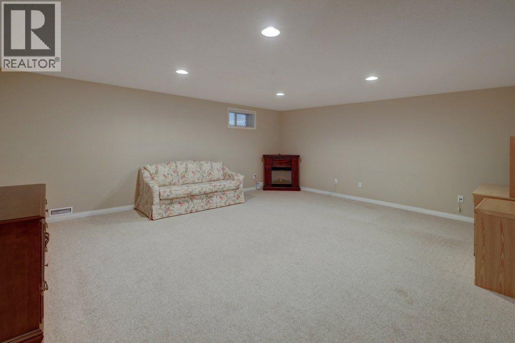 204 Silver Creek Mews Nw, Calgary, Alberta  T3B 5L1 - Photo 23 - A2260595