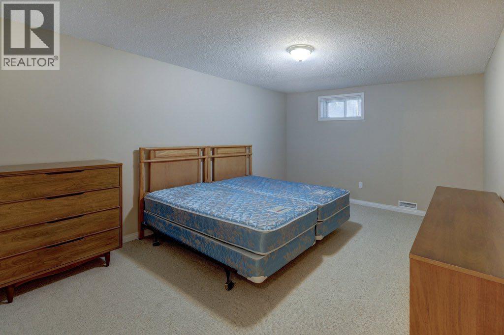 204 Silver Creek Mews Nw, Calgary, Alberta  T3B 5L1 - Photo 25 - A2260595