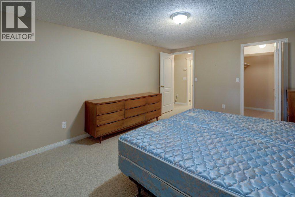 204 Silver Creek Mews Nw, Calgary, Alberta  T3B 5L1 - Photo 26 - A2260595