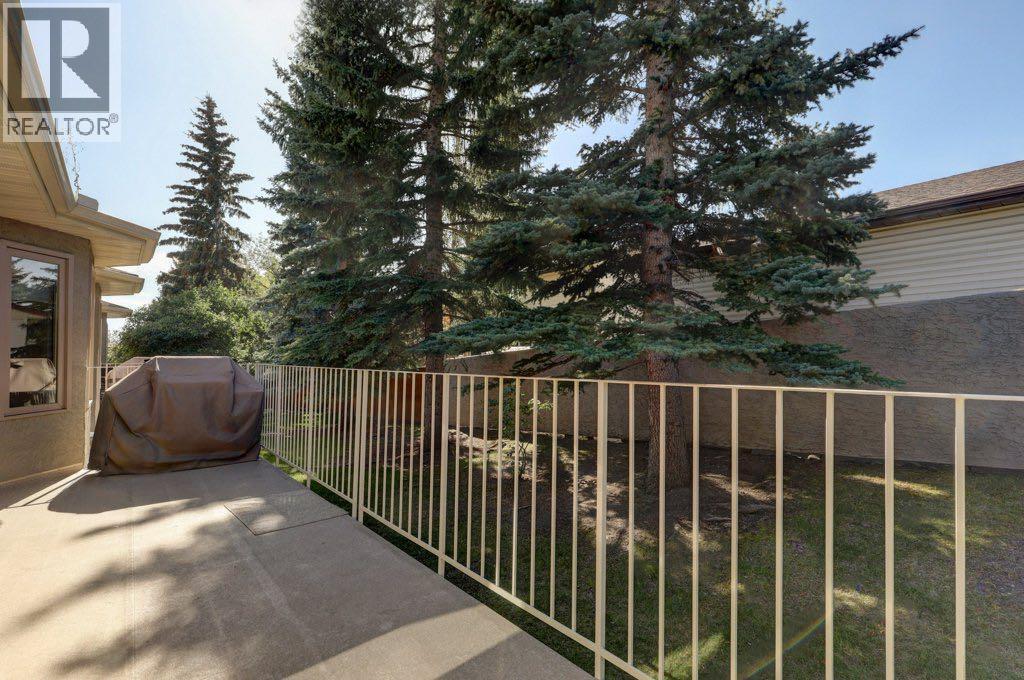 204 Silver Creek Mews Nw, Calgary, Alberta  T3B 5L1 - Photo 31 - A2260595