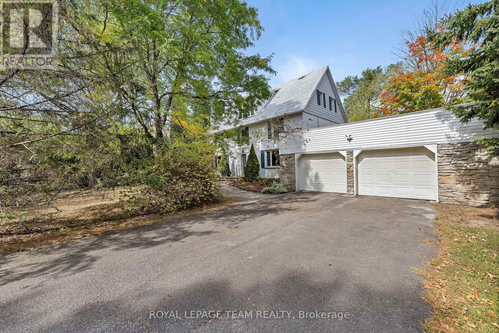 2307 Scrivens Drive, Ottawa, Ontario  K0A 2P0 - Photo 2 - X12451009