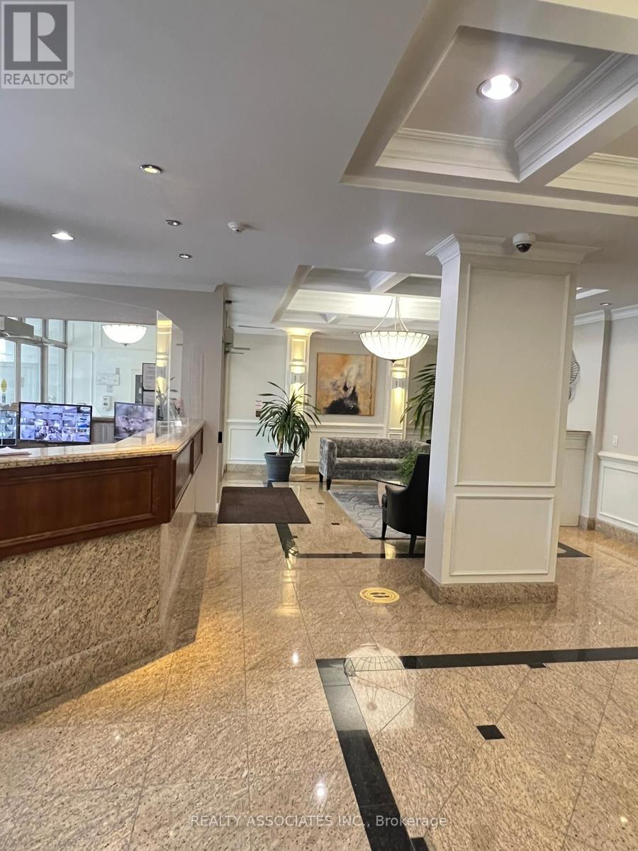 303 - 130 Pond Drive, Markham, Ontario  L3T 7W5 - Photo 7 - N12451008
