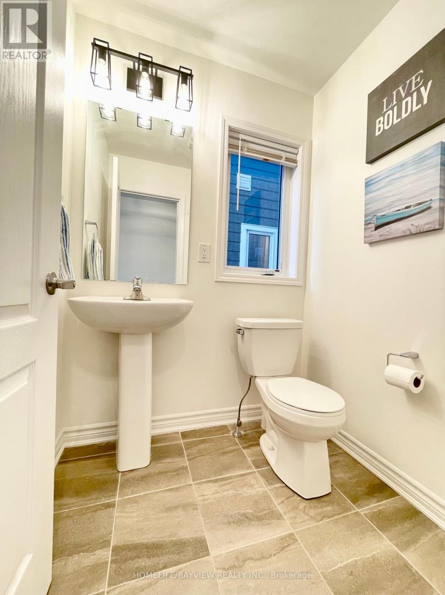 128 Village Gate Drive, Wasaga Beach, Ontario  L9Z 0J7 - Photo 9 - S12451041