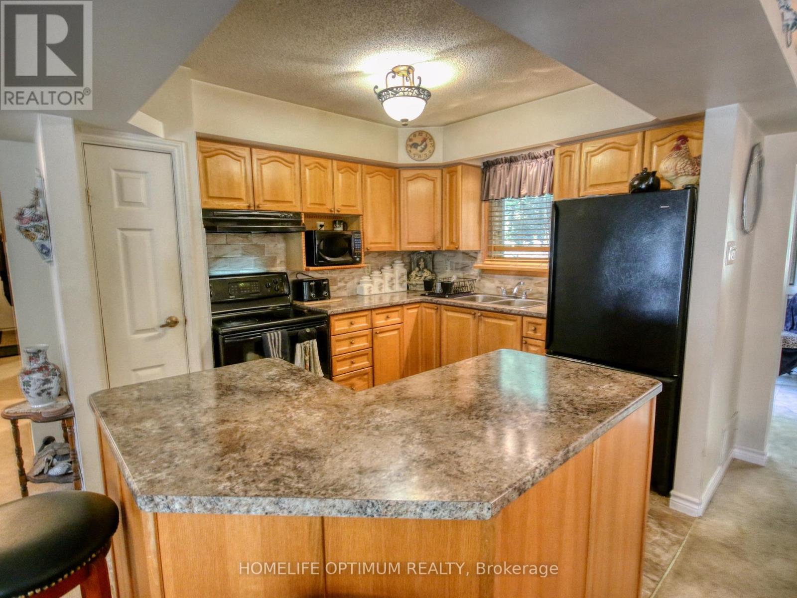228 Pirates Glen Drive, Trent Lakes, Ontario  K0M 1A0 - Photo 16 - X12451077