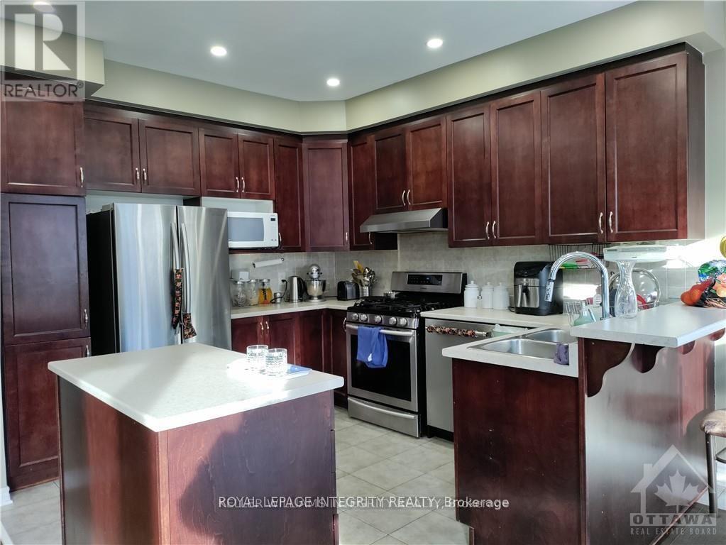 459 Celtic Ridge Crescent, Ottawa, Ontario  K2W 0B2 - Photo 8 - X12451361