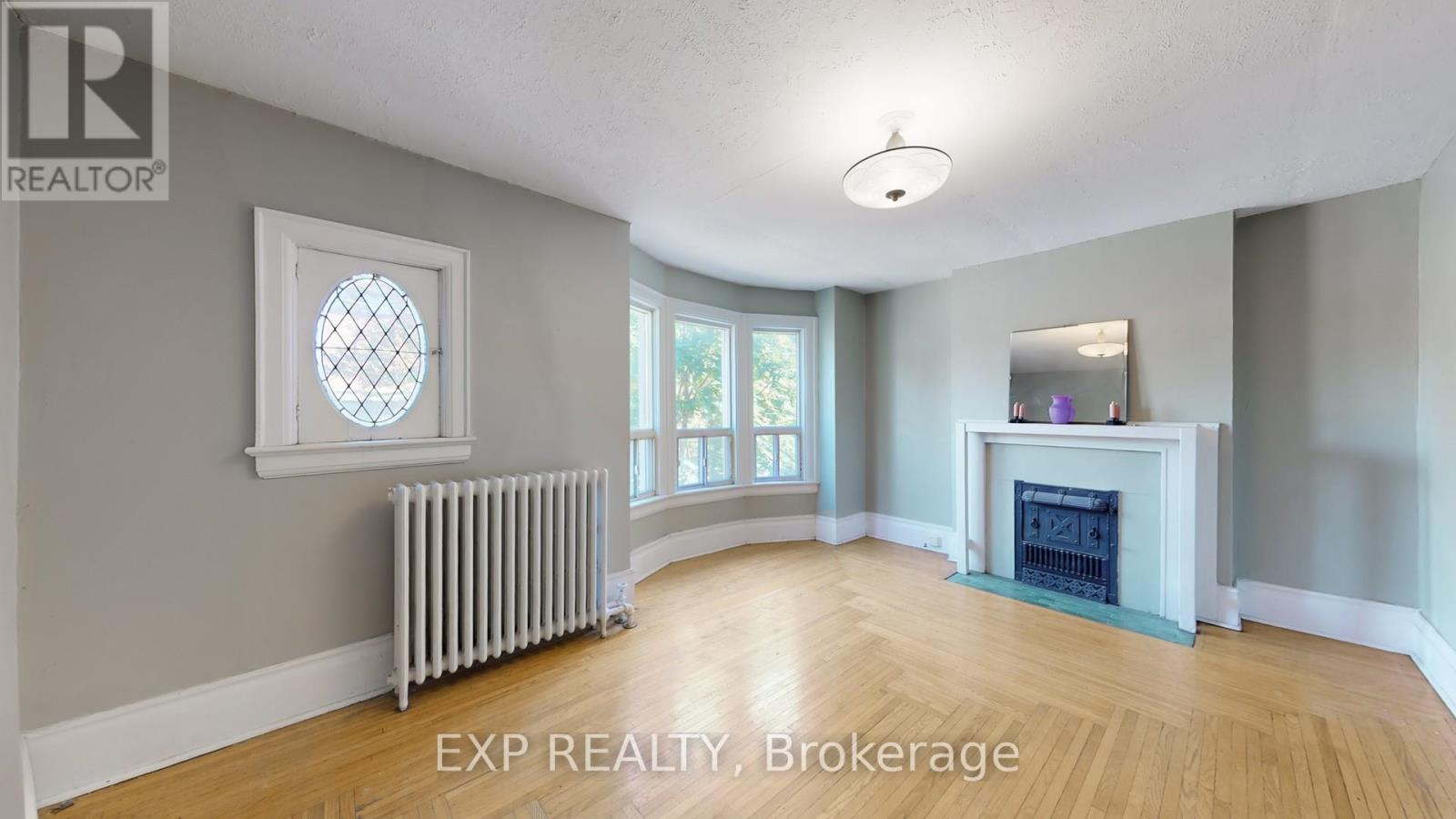 126 Close Avenue, Toronto, Ontario  M6K 2V5 - Photo 3 - W12451467
