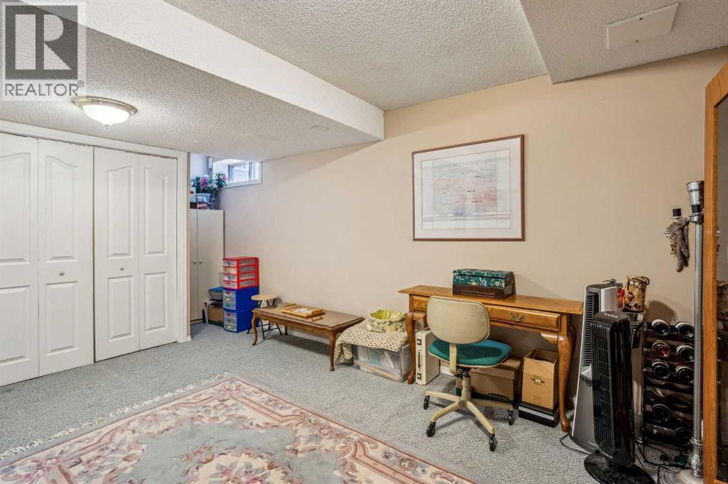 219 Mt Douglas Manor Se, Calgary, Alberta  T2Z 3C8 - Photo 22 - A2226255